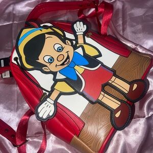 Loungefly Red Character Backpack